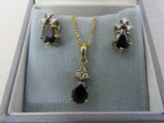 9ct gold chain (length 24 cm) with diamond and sapphire pendant & matching 9ct gold diamond and