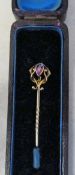 15ct gold stick pin with garnet stone total weight