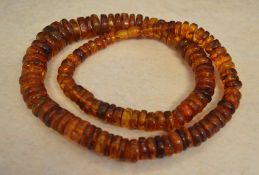 Amber disc shaped beaded necklace,