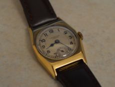 9ct gold body J W Benson wristwatch on a leather strap,