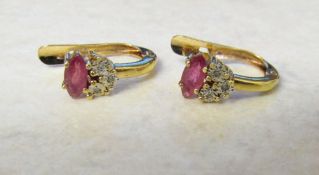 18ct gold pink ruby and diamond earrings total weight 2.