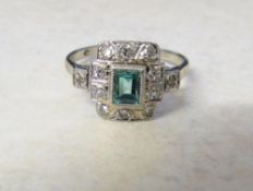 18ct white gold diamond and emerald ring in an Art Deco design total weight 2.