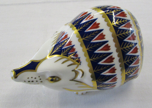 Royal Crown Derby paperweight of a hedgehog with gold stopper