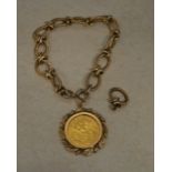 1931 22ct gold full sovereign in a 9ct gold mount on a 9ct gold twist chain,