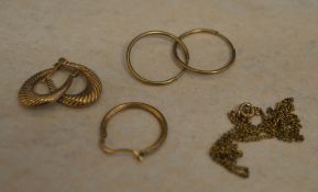 2 pairs of 9ct gold earrings, a loose 9ct gold earring and a yellow metal chain,