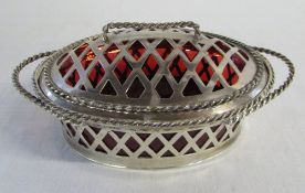 Silver lidded basket with cranberry glass interior London 1905 weight 10.