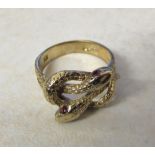 9ct gold ring consisting of two entwined serpents weight 4.