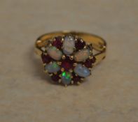 9ct gold opal and garnet cluster ring (one opal stone cracked), total approx weight 3.