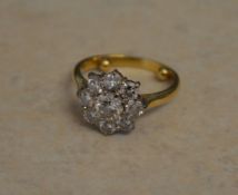 18ct gold diamond cluster ring, total approx 1.