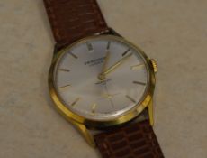 Gold plated body J W Benson, London wristwatch on a leather strap,