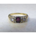 9ct gold ruby and diamond ring (diamond total 0.