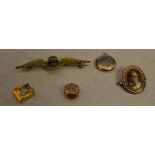 Various yellow metal including a miniature buckle, ornate button,