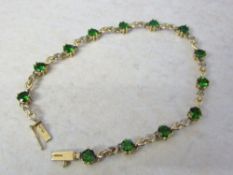 9ct gold bracelet with diopside green stones total weight 5.7 g length 7.