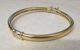 18ct gold bangle marked 750 weight 12.