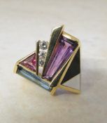 14ct gold abstract ring consisting of Mother of pearl, onyx, amethyst, topaz,
