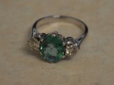 18ct gold emerald and diamond ring size O, approx 0.