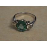 18ct gold emerald and diamond ring size O, approx 0.