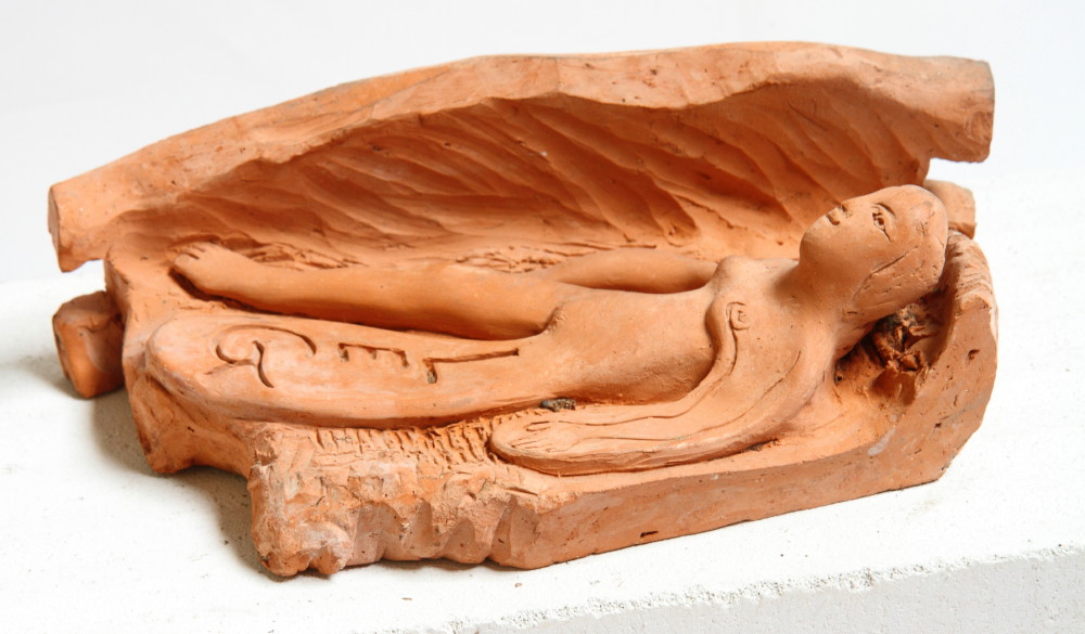David Arnatt: a terracotta figure, "Leg", 3 1/4" high (chips)