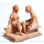 David Arnatt: a terracotta figure, "Time to Talk", monogrammed, 10 3/4" high