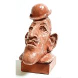 David Arnatt: a glazed terracotta figure, hook-nosed man with bowler hat, monogrammed and dated '81