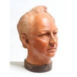 David Arnatt: a terracotta bust, self-portrait of the artist, on wood base, 13 1/4" high