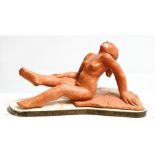 David Arnatt: a terracotta figure, reclining nude at waters edge, monogrammed 1981, 7" high