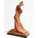 David Arnatt: a terracotta figure, child and man group, monogrammed and dated 1983, 14" high