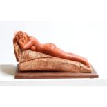 David Arnatt: a painted terracotta figure, girl lying on a towel, monogrammed 1981, 7 1/2" high