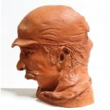 David Arnatt: a terracotta portrait bust, "Passing Heads", monogrammed, 12" high