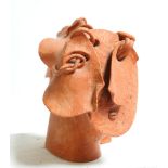 David Arnatt: a terracotta abstract head, "Homage to Surrealism", monogrammed, 9 1/4" high (chipped)