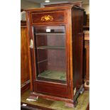 An Edwardian inlaid mahogany pedestal sheet music cabinet enclosed glazed door, 19" wide
