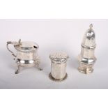 A Victorian silver pepper pot, a silver mustard pot with blue glass liner and a silver pepper pot