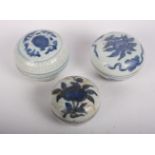 Three 18th/19th Century Chinese export blue and white covered porcelain pots, largest 3 1/4" wide (