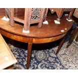 A 19th Century mahogany half round side table with double gate support