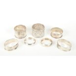 Seven silver napkin rings, various, 3oz troy approx