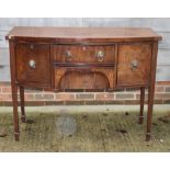 A Georgian design mahogany bowfront sideboard, fitted two central drawers and two side cupboards,