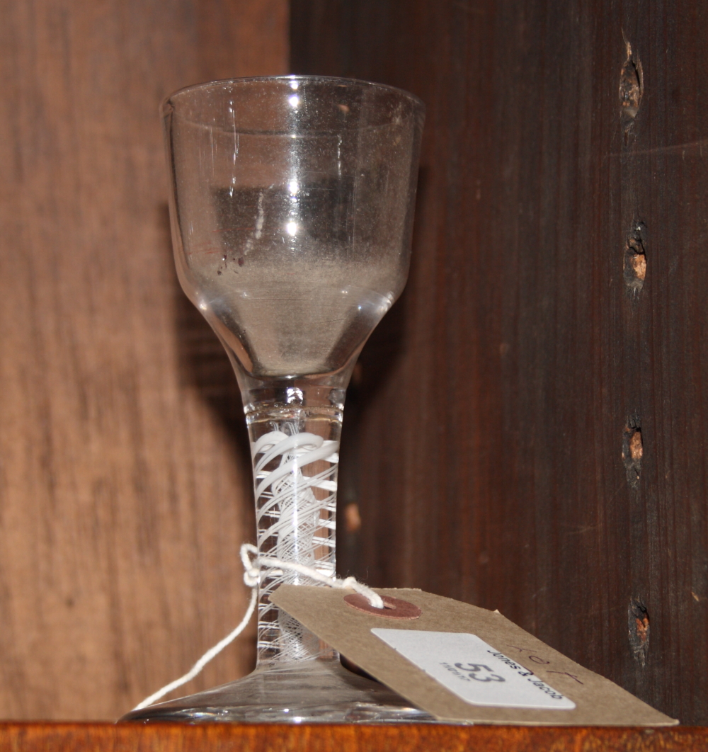 An 18th Century cordial glass with ogee bowl and double series opaque twist stem, 4 1/2" high