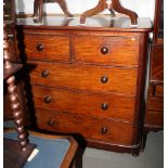 A late 19th Century mahogany chest of two short and three long drawers with turned wooden knobs,