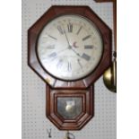 A late 19th Century drop dial wall clock with octagonal dial by Seth Thomas, 24" high