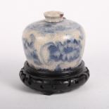 Two 18th/19th Century Chinese blue and white glazed earthenware vases on wooden stands and two