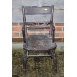 A child's 19th Century Windsor armchair with pierced back rail