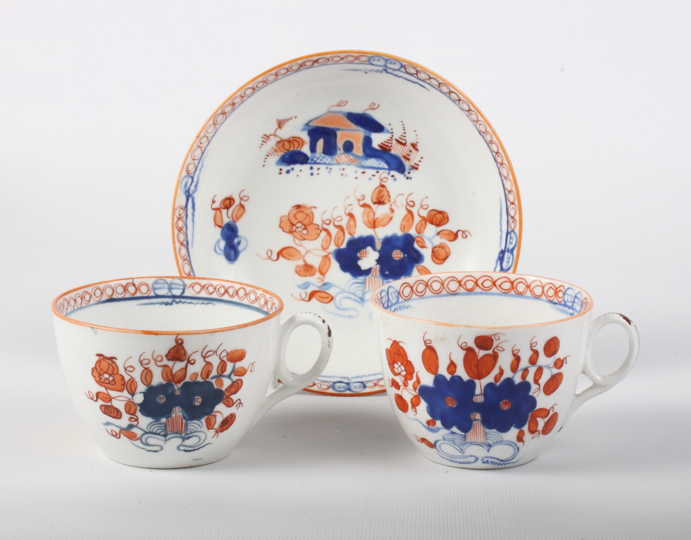 A New Hall bone china pattern 1084 tea cup and saucer with factory backstamp and a companion tea