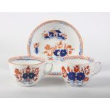 A New Hall bone china pattern 1084 tea cup and saucer with factory backstamp and a companion tea