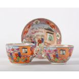 A New Hall "boy in the window" pattern tea bowl cup and saucer