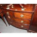 A 19th Century mahogany bowfront chest of two short and two long drawers with brass handles