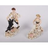 A pair of Royal Crown Derby figures of a shepherd and shepherdess by Edward Drew (restorations)