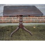 An 18th Century mahogany rectangular tilt top occasional table, on tripod base, 36" x 31"