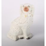 A Royal Doulton white china figure, "Lovers" HN2762, a Staffordshire seated spaniel, a pair of