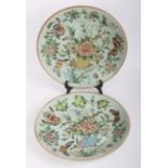 A pair of 19th Century Cantonese plates enamelled with birds and butterflies, seal character mark in