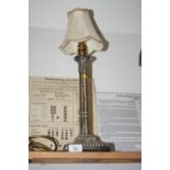 A silver plated Corinthian cluster column candlestick, fitted as a table lamp on square base, 13"